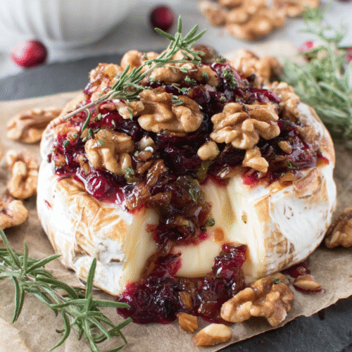 deliciously warm baked brie with cranberry sauce